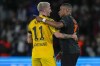 Dortmund's Marco Reus, left, congratulates PSG's Kylian Mbappe after the Champions League group F soccer match between Paris Saint-Germain and Borussia Dortmund, at the Parc des Princes stadium in Paris, France, Tuesday, Sept. 19, 2023. (AP Photo/Michel Euler)