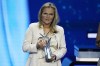 England's head coach Sarina Wiegman holds a trophy for the UEFA Women's Coach of the Year for 2022/23 after the 2023/24 UEFA Champions League group stage draw at the Grimaldi Forum in Monaco, Thursday, Aug. 31, 2023. (AP Photo/Daniel Cole)