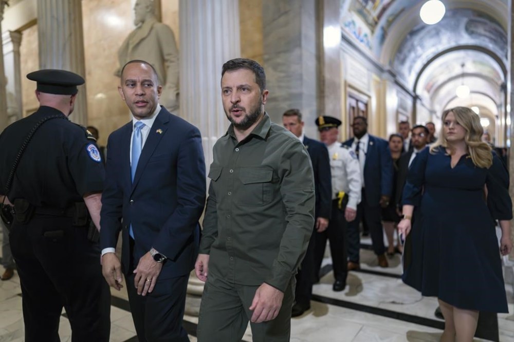 Ukrainian President Volodymyr Zelenskyy is welcomed to the Capitol in Washington, by House Minority Leader Hakeem Jeffries, D-N.Y., left, Thursday, Sept. 21, 2023. It is Zelenskyy's second visit to Washington since Russia invaded and comes as President Joe Biden's request to Congress for an additional $24 billion for Ukraine is hanging in the balance. (AP Photo/J. Scott Applewhite)