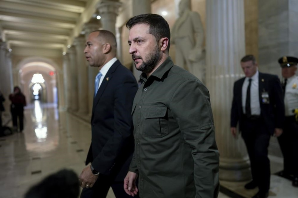 Ukrainian President Volodymyr Zelenskyy is welcomed to the Capitol in Washington, by House Minority Leader Hakeem Jeffries, D-N.Y., left, Thursday, Sept. 21, 2023. It is Zelenskyy's second visit to Washington since Russia invaded and comes as President Joe Biden's request to Congress for an additional $24 billion for Ukraine is hanging in the balance. (AP Photo/J. Scott Applewhite)