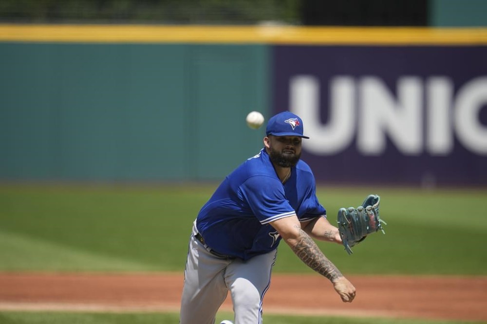 Toronto Blue Jays right-hander Alek Manoah has received multiple injections in his pitching arm in recent weeks and been shut down for the season, an online report said Thursday. Manoah pitches in the first inning of a baseball game against the Cleveland Guardians, in Cleveland, Thursday, Aug. 10, 2023. THE CANADIAN PRESS/AP-Sue Ogrocki