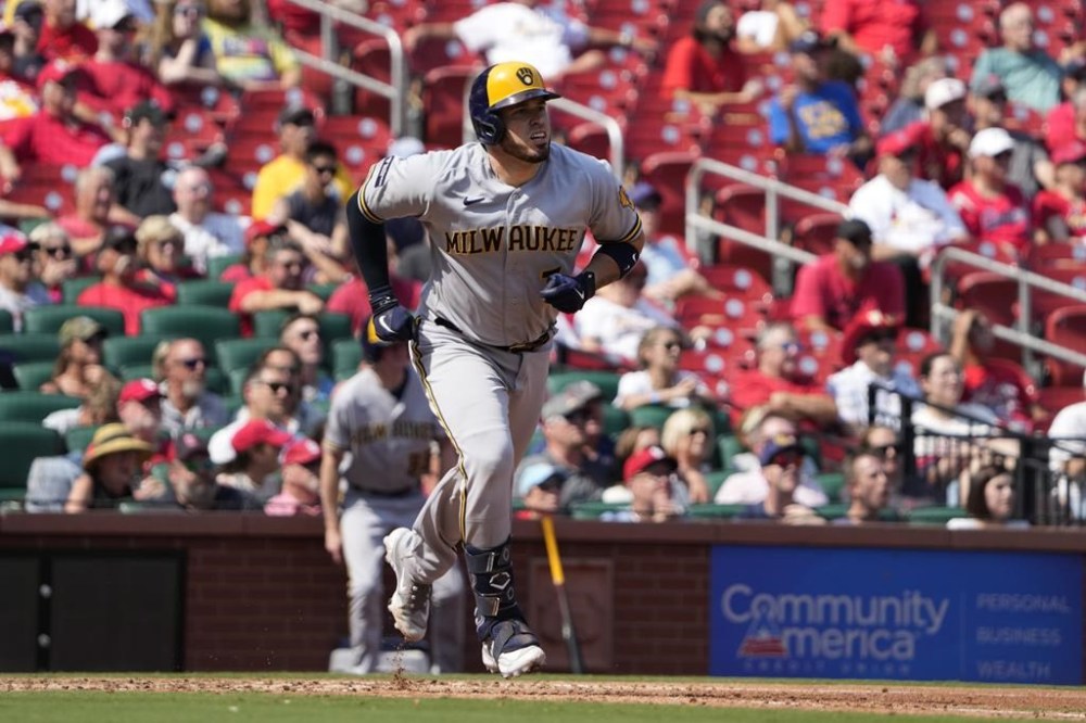 Milwaukee Brewers' Victor Caratini watches his three-run home run during the sixth inning of a baseball game against the St. Louis Cardinals Thursday, Sept. 21, 2023, in St. Louis. (AP Photo/Jeff Roberson)