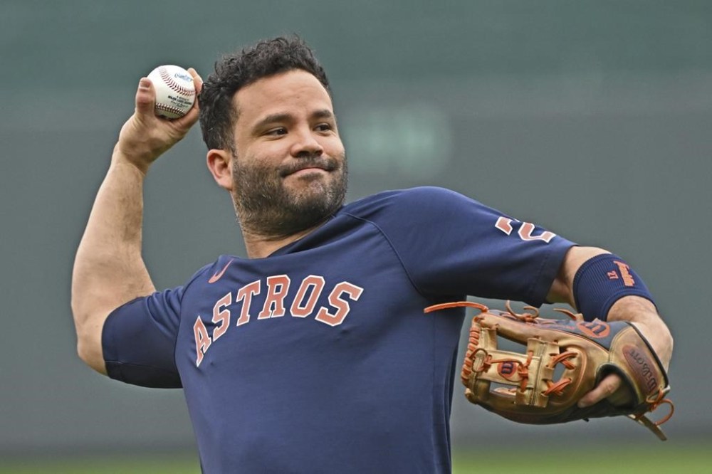 FILE - Houston Astros second baseman Jose Altuve throws during batting practice, before a baseball game against the Kansas City Royals, Saturday, Sept. 16, 2023, in Kansas City, Mo. The reigning World Series champion Astros will go into the final 10 days of the regular season with only a half-game lead in the AL West over both Seattle and Texas after all were off Thursday, Sept. 21. “I don’t think it’s going be a problem for us to go out there and focus and win some games,” said Altuve, adding that past success should definitely help them down the stretch. (AP Photo/Peter Aiken, File)