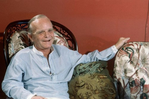 FILE - Author Truman Capote, shown in his apartment on July, 23, 1980. (AP Photo/Nancy Kaye, File)