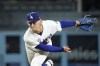 Los Angeles Dodgers starting pitcher Emmet Sheehan throws to the plate during the first inning of a baseball game against the San Francisco Giants Thursday, Sept. 21, 2023, in Los Angeles. (AP Photo/Mark J. Terrill)