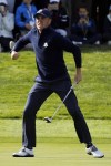 FILE - Justin Thomas of the U.S. reacts after winning his fourball match with teammate Jordan Spieth on the second day of the 2018 Ryder Cup at Le Golf National in Saint Quentin-en-Yvelines, outside Paris, France, Saturday, Sept. 29, 2018. Thomas has a 6-2-1 record in the Ryder Cup going into the Rome matches on Sept. 29-Oct. 1.(AP Photo/Francois Mori, File)