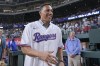 Juan Gonzalez walks onto the field before a baseball game between the Texas Rangers and the Seattle Mariners in Arlington, Texas, Friday, Sept. 22, 2023. Gonzalez received his Texas Rangers Hall of Fame jacket in a pregame ceremony, eight years after his induction and 20 years after his last game for the team. (AP Photo/LM Otero)