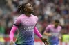 AC Milan's Rafael Leao celebrates after scoring his side's opening goal during the Serie A soccer match between AC Milan and Hellas Verona at the San Siro stadium in Milan, Italy, Saturday, Sept. 23, 2023. (AP Photo/Luca Bruno)