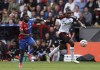 Crystal Palace's Odsonne Edouard, left and Fulham's Issa Diop vie for the ball, during the English Premier League soccer match between Crystal Palace and Fulham at Selhurst Park, London, Saturday, Sept. 23, 2023. (Kieran Cleeves/PA via AP)