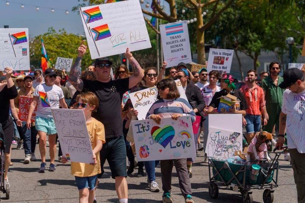 FILE - Supporters of gay, lesbian, drag, queer, and transgender rights attend a rally during an Easter Sunday Drag March in protest of anti-LGBTQ legislation nationwide, in West Hollywood, Calif., on Sunday, April 9, 2023. On Friday, Sept. 22, 2023, California Gov. Gavin Newsom announced his veto of a bill that would have required judges to consider whether a parent affirms their child's gender identity when making custody and visitation decisions. (AP Photo/Damian Dovarganes, File)