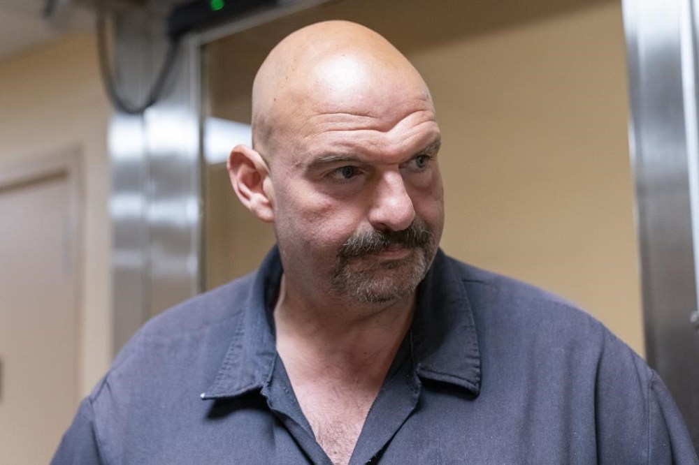 FILE - Sen. John Fetterman, D-Pa., speaks with reporters as he walks to a vote on Capitol Hill, Wednesday, Sept. 6, 2023, in Washington. (AP Photo/Alex Brandon, File)