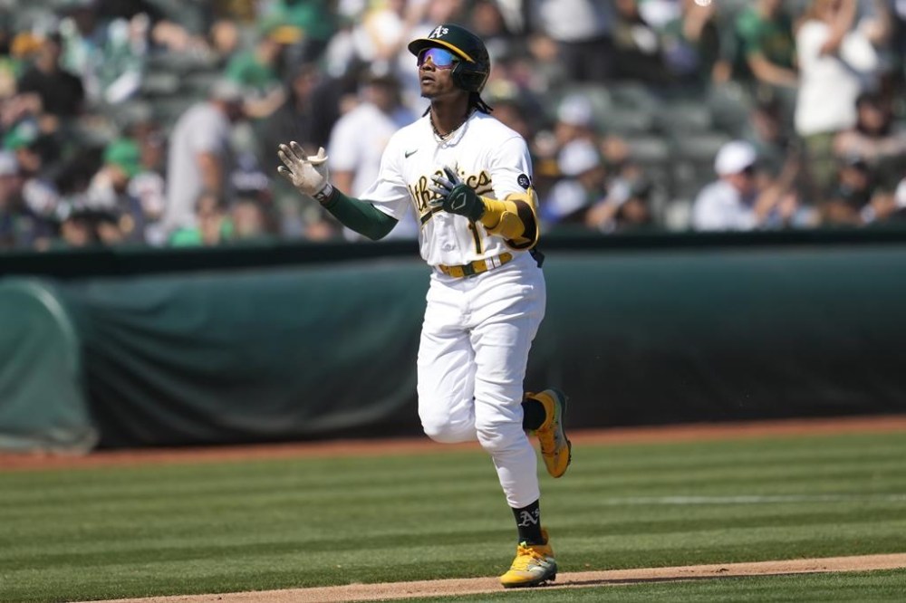 Oakland Athletics' Esteury Ruiz (1) gestures after hitting a two-run home run against the Detroit Tigers during the third inning of a baseball game in Oakland, Calif., Saturday, Sept. 23, 2023. (AP Photo/Jeff Chiu)