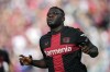 Leverkusen's scorer Victor Boniface celebrates after scoring the opening goal during the German Bundesliga soccer match between Bayer Leverkusen and FC Heidenheim in Leverkusen, Germany, Sunday, Sept. 24, 2023. (AP Photo/Martin Meissner)