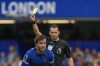 Referee Jarred Gillett shows a yellow card to Chelsea's Ben Chilwell during the English Premier League soccer match between Chelsea and Aston Villa at Stamford Bridge stadium in London, Sunday, Sept. 24, 2023. (AP Photo/Alastair Grant)