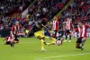 Newcastle United's Bruno Guimaraes scores his side's seventh goal of the game, during the English Premier League soccer match between Sheffield United and Newcastle United, at Bramall Lane, in Sheffield, England, Sunday, Sept. 24, 2023. (Martin Rickett/PA via AP)