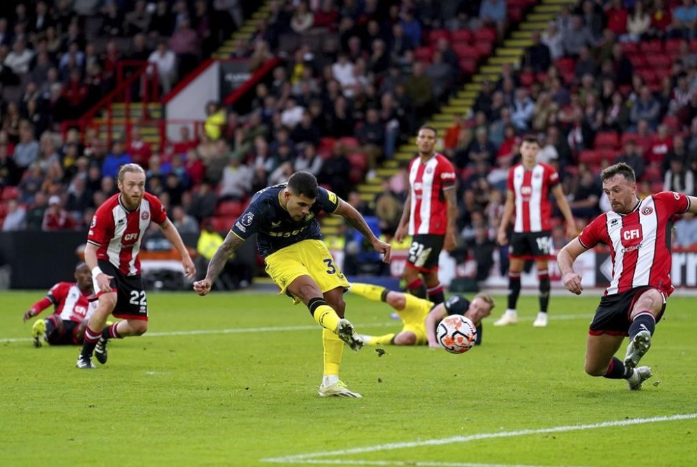 Newcastle United's Bruno Guimaraes scores his side's seventh goal of the game, during the English Premier League soccer match between Sheffield United and Newcastle United, at Bramall Lane, in Sheffield, England, Sunday, Sept. 24, 2023. (Martin Rickett/PA via AP)