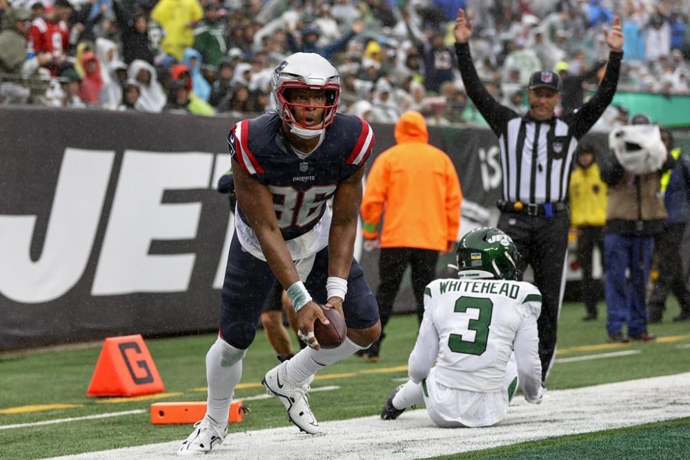 New England Patriots tight end Pharaoh Brown (86) celebrates after scoring a touchdown against the New York Jets during the second quarter of an NFL football game, Sunday, Sept. 24, 2023, in East Rutherford, N.J. (AP Photo/Adam Hunger)
