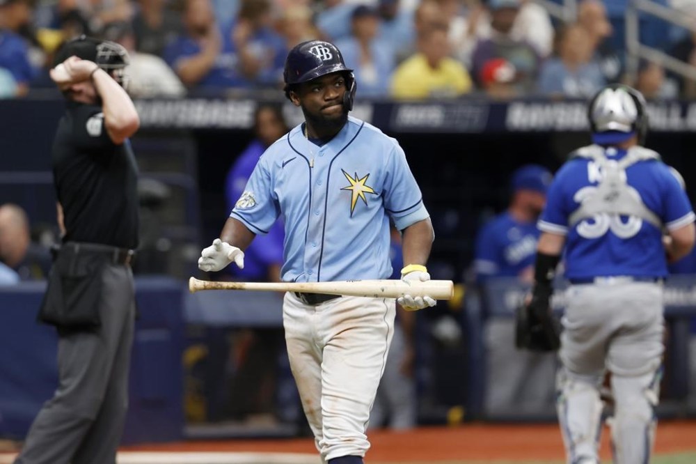 Tampa Bay Rays' Osleivis Basabe walks to the dugout after striking out against the Toronto Blue Jays during the eighth inning of a baseball game, Sunday, Sept. 24, 2023, in St. Petersburg, Fla. (AP Photo/Scott Audette)
