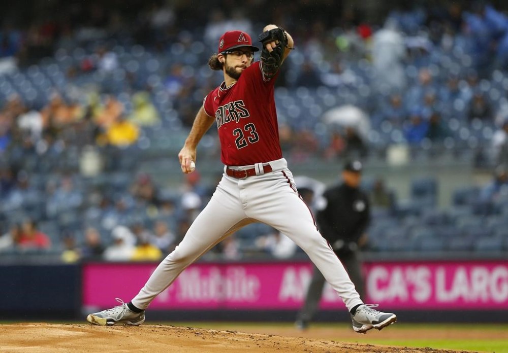 Arizona Diamondbacks starting pitcher Zac Gallen delivers during a baseball game against the New York Yankees, Sunday, Sept. 24, 2023, in New York. (AP Photo/John Munson)