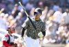San Diego Padres' Juan Soto tosses his bat after hitting a three-run home run during the first inning of a baseball game against the St. Louis Cardinals, Sunday, Sept. 24, 2023, in San Diego. (AP Photo/Denis Poroy)