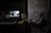 A Ukrainian member of an elite drone unit sits inside a basement in between operations on the front line in the outskirts of Kremmina, Ukraine, Sunday, Aug. 20, 2023. The drone unit's task is to destroy Russia's heavy machinery, armored vehicles and infantry. The drone unit's task is to destroy Russia's heavy machinery, armored vehicles and infantry. (AP Photo/Bram Janssen)