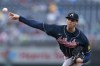Atlanta Braves relief pitcher Kyle Wright delivers in the rain during the seventh inning of a baseball game against the Washington Nationals, Sunday, Sept. 24, 2023, in Washington. (AP Photo/Stephanie Scarbrough)