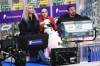 FILE - Russian Kamila Valieva, center, her coach Eteri Tutberidze, left, and choreographer Daniil Gleikhengauz wait for result of her competing in the women's free skate program during the figure skating competition at the 2022 Russian Figure Skating Grand Prix, the Golden Skate of Moscow, at Megasport Arena in Moscow, Russia, on Oct. 23, 2022. The doping case of teenage Russian figure skater Kamila Valieva that shocked the 2022 Beijing Olympics returns to the highest court in sports on Tuesday, Sept. 26, 2023. (AP Photo/Alexander Zemlianichenko)
