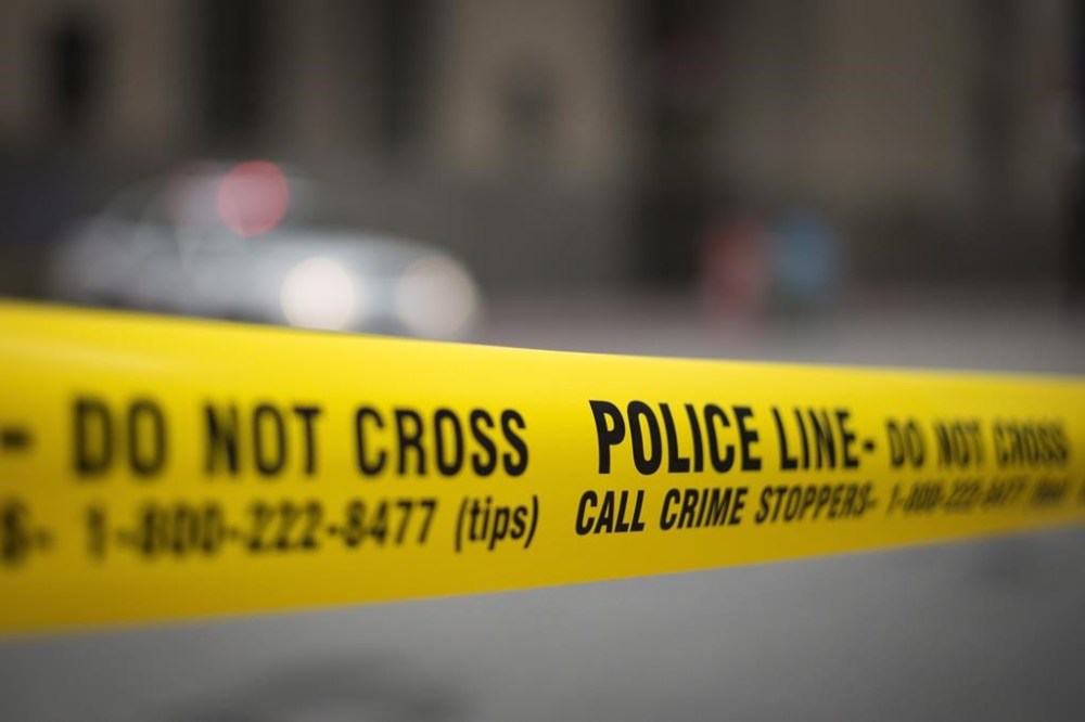 Roadways surrounding Ontario's legislature are blocked by several police vehicles and city garbage trucks this morning as police say they have intelligence a convoy is descending into Toronto. Police tape is shown in Toronto on May 2, 2017. .THE CANADIAN PRESS/Graeme Roy