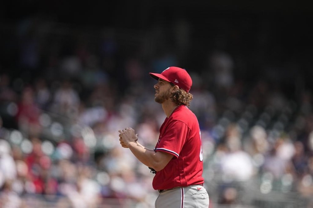Philadelphia Phillies starting pitcher Aaron Nola (27) delivers in the first inning of a baseball game against the Atlanta Braves, Wednesday, Sept. 20, 2023, in Atlanta. (AP Photo/Brynn Anderson)