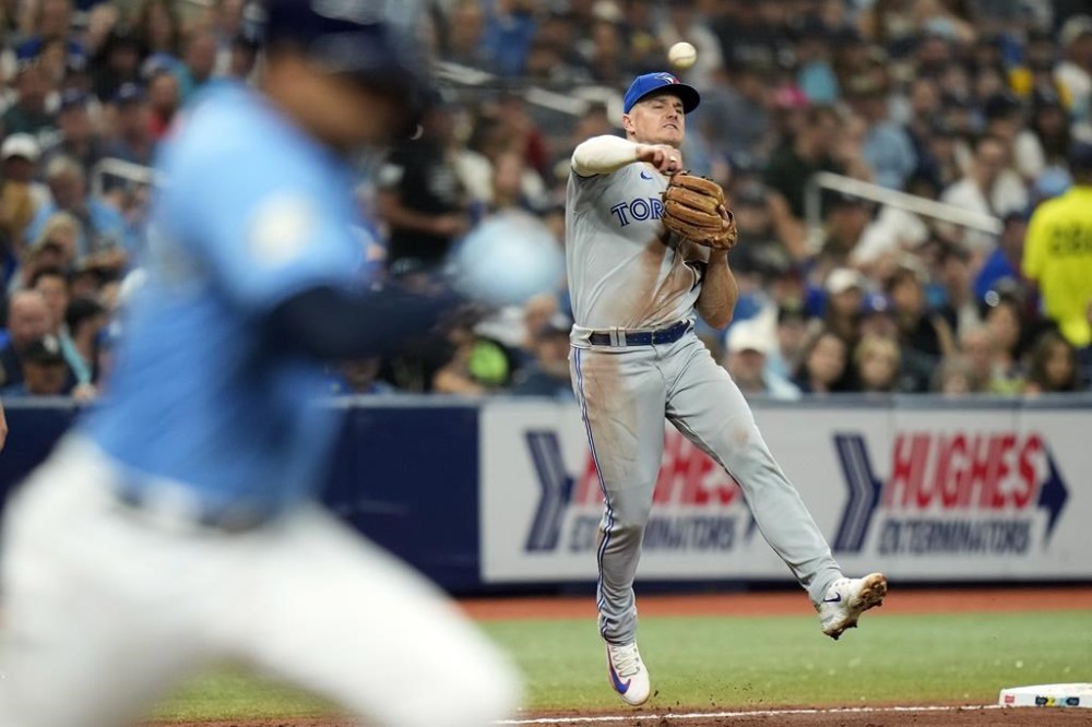 Toronto Blue Jays third baseman Matt Chapman throws out Tampa Bay Rays' Christian Bethancourt at first base during the fifth inning of a baseball game Saturday, Sept. 23, 2023, in St. Petersburg, Fla. (AP Photo/Chris O'Meara)