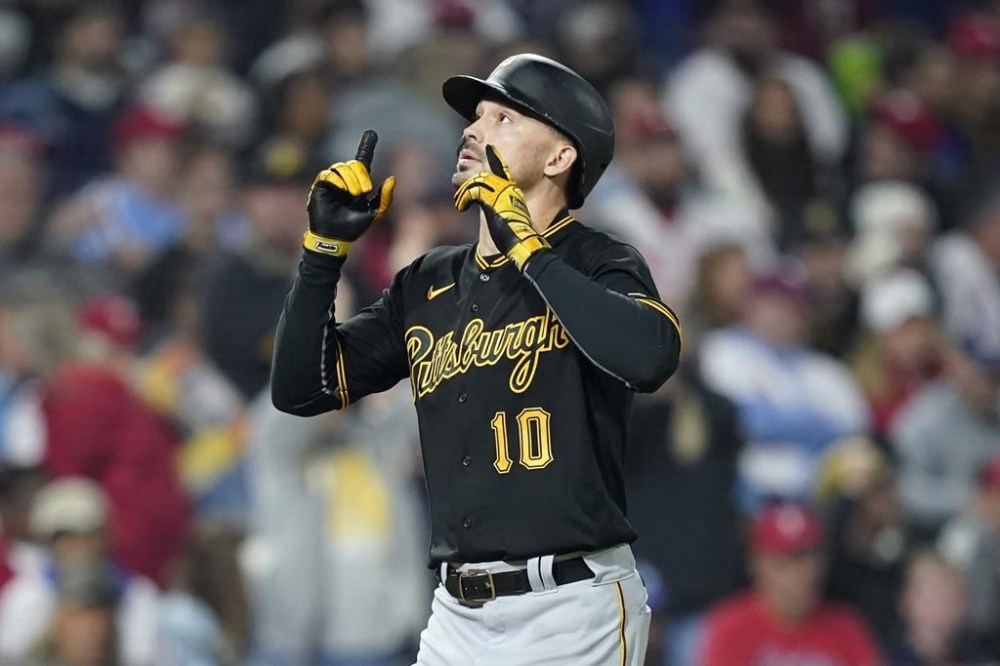 Pittsburgh Pirates' Bryan Reynolds reacts after hitting a home run against Philadelphia Phillies pitcher Aaron Nola during the seventh inning of a baseball game, Tuesday, Sept. 26, 2023, in Philadelphia. (AP Photo/Matt Slocum)