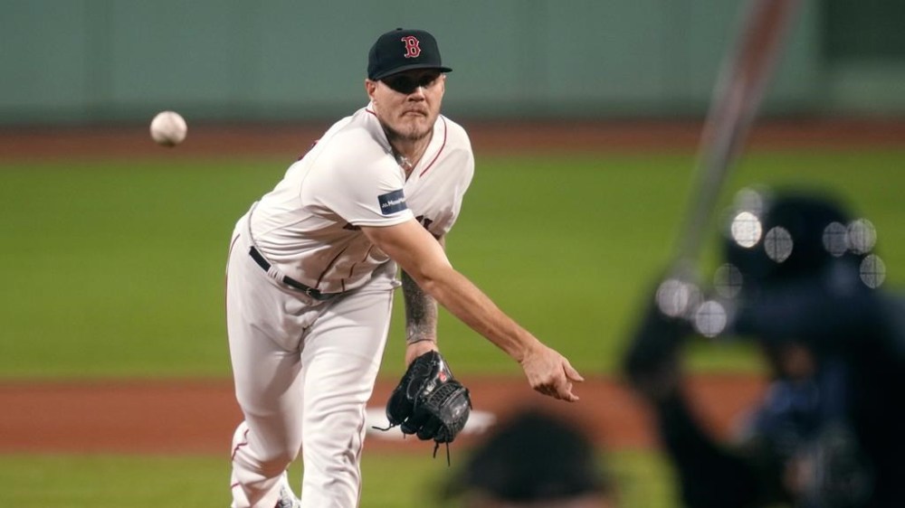 Boston Red Sox starting pitcher Tanner Houck delivers during the first inning of the team's baseball game against the Tampa Bay Rays at Fenway Park, Tuesday, Sept. 26, 2023, in Boston. (AP Photo/Charles Krupa)