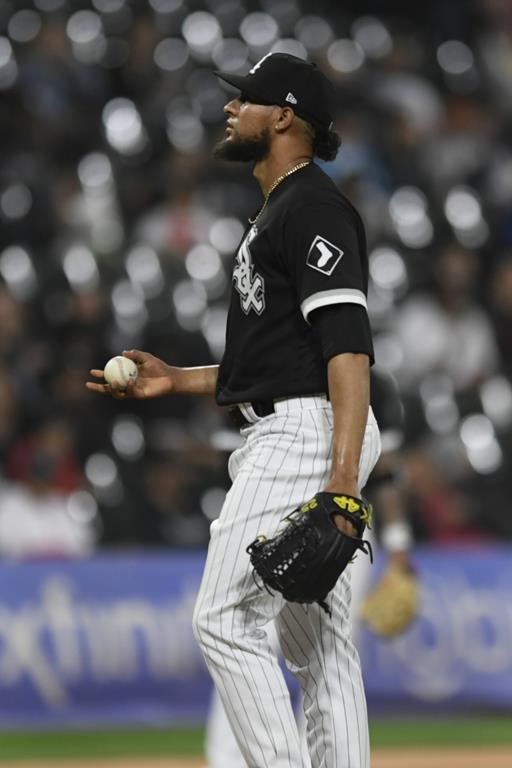 Chicago White Sox relief pitcher Yohan Ramirez reacts after giving up a two-run home run to Arizona Diamondbacks' Christian Walker during the sixth inning of a baseball game, Tuesday, Sept. 26, 2023, in Chicago. (AP Photo/Paul Beaty)