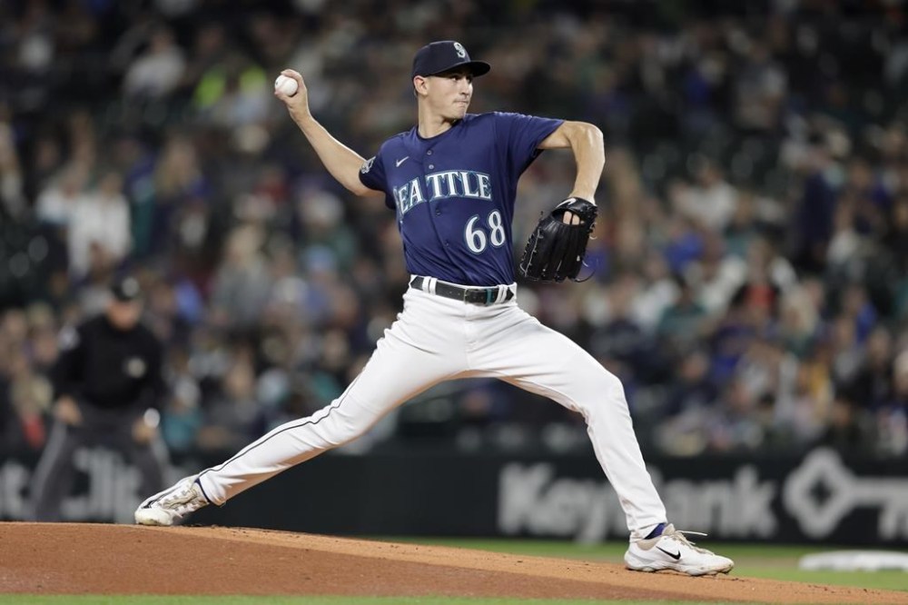 Seattle Mariners starting pitcher George Kirby throws to a Houston Astros batter during the first inning of a baseball game, Tuesday, Sept. 26, 2023, in Seattle. (AP Photo/John Froschauer)