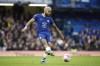 FILE -Chelsea's Reece James passes the ball during the English Premier League soccer match between Chelsea and Aston Villa at Stamford Bridge stadium in London, Saturday, April 1, 2023. Chelsea defender Reece James has been charged by the FA for an alleged altercation with a match official, English soccer's governing body said Wednesday, Sept. 27, 2023. The incident is said to have occurred after Chelsea’s 1-0 loss against Aston Villa on Sunday. (AP Photo/David Cliff, File)