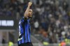 Inter Milan's Denzel Dumfries celebrates after scoring his side's opening goal during the Serie A soccer match between Inter Milan and Sassuolo at the San Siro Stadium, in Milan, Italy, Wednesday, Sept. 27, 2023. (AP Photo/Antonio Calanni)