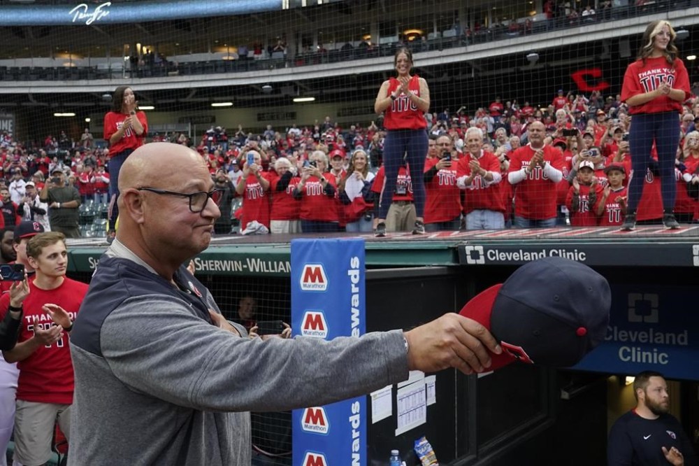 Cleveland Guardians manager Terry Francona tips his cap for the crowd following a tribute video before the team's baseball game against the Cincinnati Reds, Wednesday, Sept. 27, 2023, in Cleveland. Although he hasn't officially announced his retirement, Francona is expected to do so formally early next week. (AP Photo/Sue Ogrocki)