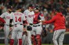 Washington Nationals starting pitcher Patrick Corbin, center, hands the ball to manager Dave Martinez, right, while being pulled for a reliever during the fifth inning of a baseball game, Wednesday, Sept. 27, 2023, in Baltimore. (AP Photo/Julio Cortez)