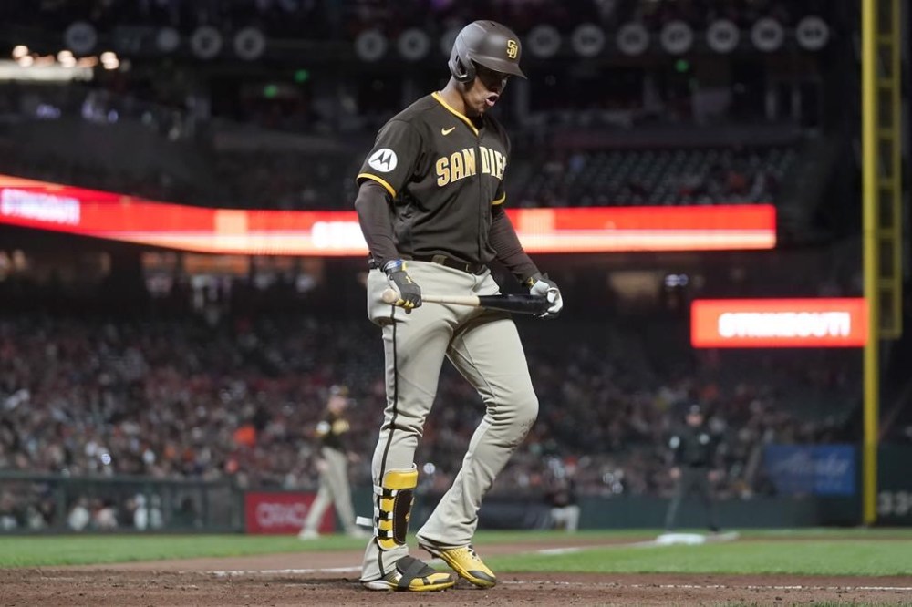 San Diego Padres' Juan Soto reacts after striking out against the San Francisco Giants during the eighth inning of a baseball game in San Francisco, Wednesday, Sept. 27, 2023. (AP Photo/Jeff Chiu)