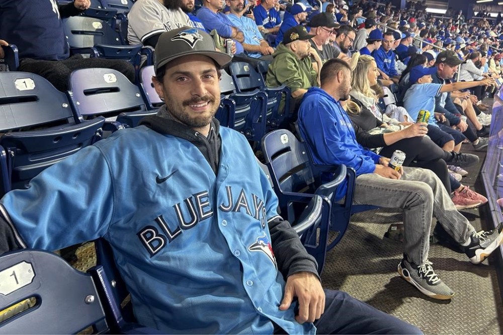 Blue Jays fan Frankie Lasagna attends a Blue Jays game in Toronto, Wednesday, Sept. 27, 2023. Lasagna found himself trending along with Aaron Judge after the Yankees slugger hit his American League record-tying 61st home run in Toronto a year ago. The Italian restaurant owner was one of a handful of fans who were inches away from catching the collector's item at Rogers Centre. THE CANADIAN PRESS/Greg Strong