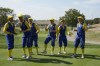 The Guardians of the Cup, European super fans pose for the camera ahead of the Ryder Cup at the Marco Simone Golf Club in Guidonia Montecelio, Italy, Thursday, Sept. 28, 2023. Outside the ropes at the Ryder Cup, there's another Europe vs. United States rivalry. In the blue corner, there's the Guardians of the Cup - a bunch of university pals from Nottingham in England regaling the European team. In the red corner, there's the American Marshals - a group of friends from Minnesota wearing helmets with horns and backing the U.S. team. (AP Photo/Alessandra Tarantino)