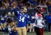 Blue Bombers placekicker Sergio Castillo is used to having football players run full blast at him while he concentrates on kicking balls. Castillo (14) makes the conversion kick against the Montreal Alouettes during second half CFL action in Winnipeg, Thursday, Aug. 24, 2023.  THE CANADIAN PRESS/John Woods