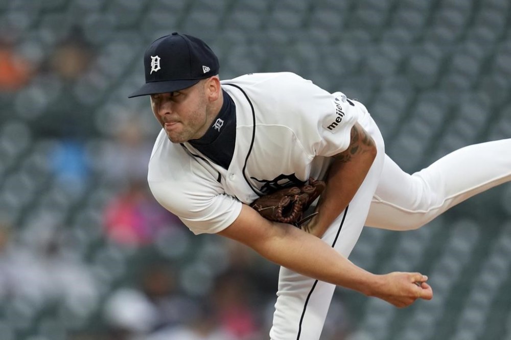Detroit Tigers relief pitcher Alex Lange throws against the Kansas City Royals in the ninth inning of a baseball game, Thursday, Sept. 28, 2023, in Detroit. (AP Photo/Paul Sancya)