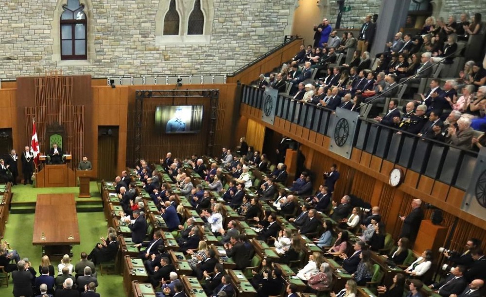 Overall view of Ukrainian President Volodymyr Zelenskyy speaking in the House of Commons in Ottawa on Friday, Sept. 22, 2023. Yaroslav Hunka watches and applauds at far right, centre. It later emerged that Hunka had fought in Ukraine during the Second World War with the Waffen-SS Galicia Division, a volunteer unit created by the Nazis to help fight the Soviet Union. THE CANADIAN PRESS/Patrick Doyle