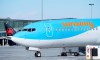 A Sunwing aircraft is parked at Montreal Trudeau airport in Montreal on Wednesday, March 2, 2022.WestJet says it aims to wind down Sunwing Airlines and integrate the low-cost carrier into its mainline business by October of next year. THE CANADIAN PRESS/Paul Chiasson