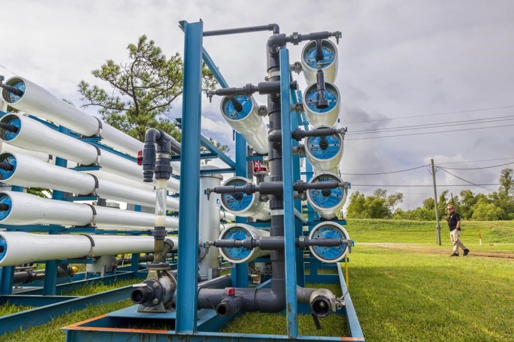 Reverse osmosis equipment that will be installed in a water treatment plant in Pointe a la Hache, La., as Plaquemines Parish deals with salt water intrusion at the parish's intake pipes in the Mississippi River on Friday, Sept. 29, 2023. A mass inflow of salt water from the Gulf of Mexico creeping up the drought-stricken Mississippi River is threatening drinking water supplies in Louisiana. (Chris Granger/The Times-Picayune/The New Orleans Advocate via AP)