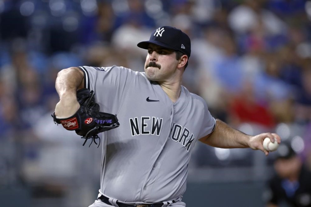New York Yankees pitcher Carlos Rodon delivers to a Kansas City Royals batter during the first inning of a baseball game in Kansas City, Mo., Friday, Sept. 29, 2023. (AP Photo/Colin E. Braley)