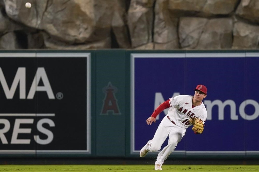 Los Angeles Angels center fielder Mickey Moniak prepares to catch a line drive hit by Oakland Athletics' JJ Bleday during the ninth inning of a baseball game Friday, Sept. 29, 2023, in Anaheim, Calif. (AP Photo/Ryan Sun)