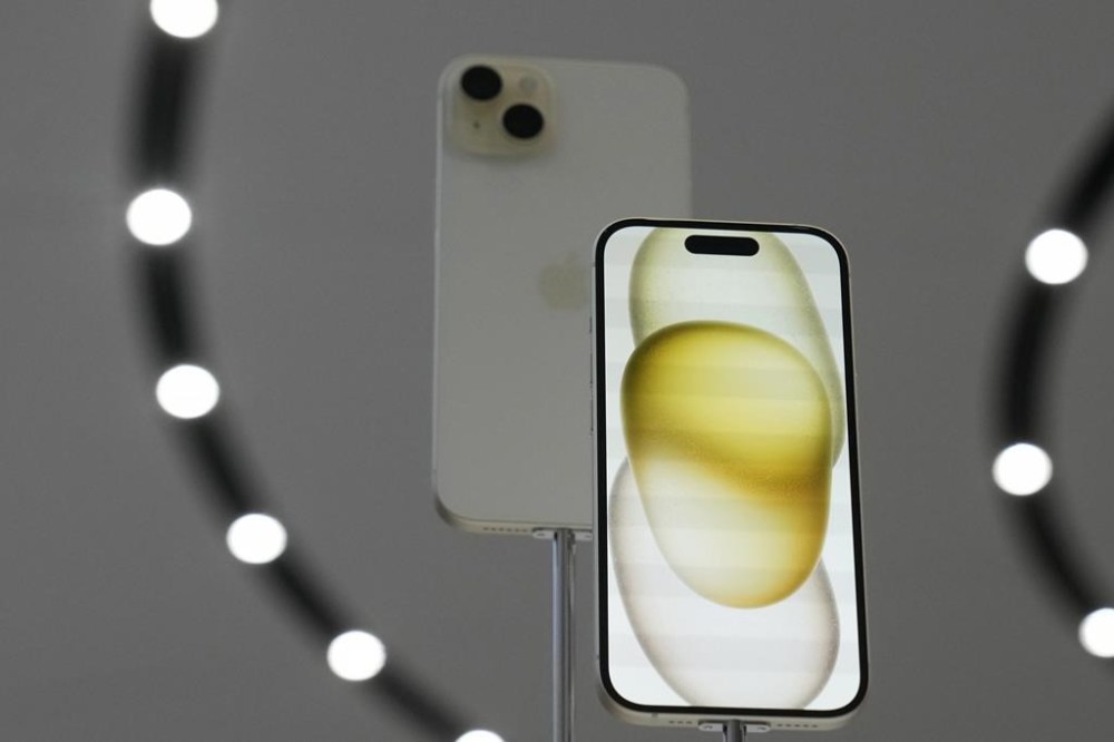 FILE - The iPhone 15 phones are shown during an announcement of new products on the Apple campus in Cupertino, Calif., Tuesday, Sept. 12, 2023. Apple on Saturday, Sept. 30, blamed a software bug some other issues tied to popular apps such as Instagram and Uber for causing its recently released iPhone 15 models to overheat and sparking complaints about being too hot to handle. (AP Photo/Jeff Chiu, File)