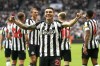 Newcastle United's Miguel Almiron celebrates scoring during the English Premier League soccer match between Newcastle United and Burnley at St. James' Park, Newcastle, England, Saturday Sept. 30, 2023. (Owen Humphreys/PA via AP)
